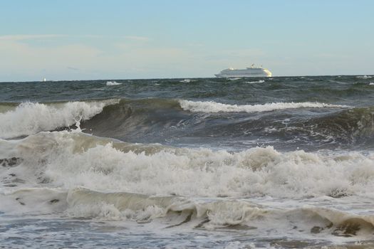 Outbound ship at sea during a storm in Malaga