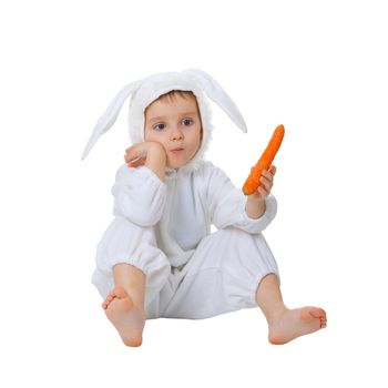 A child dressed as a rabbit with a carrot isolated on white background