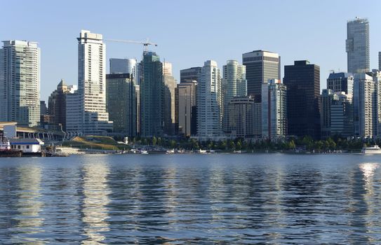 Vancouver BC skyline and tourist hydroplanes.