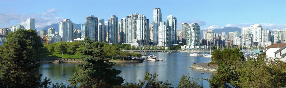 Vancouver BC skyline at False Creek river, Canada.
