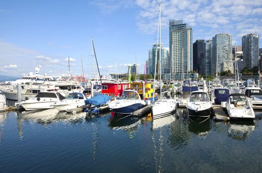 Vancouver BC marina and downtown skyline.