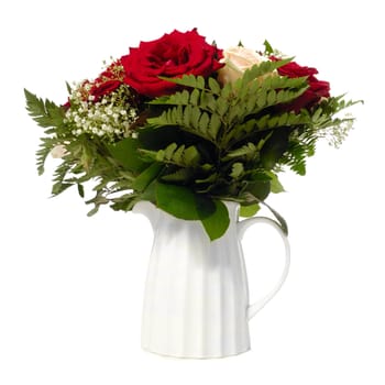 Bouquet of mixed flowers in vase taken on a white background