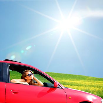 woman in red car get out window