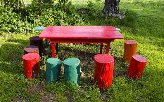 colorful rural garden furniture in springtime