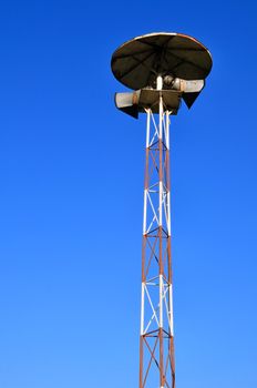 A view with a megaphone against blue sky