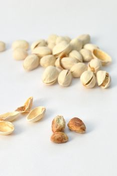 Pistachio nuts on isolated white background