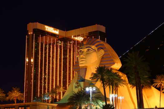 Las Vegas, USA - October 29, 2011: Luxor Las Vegas has an Egyptian theme and a large replica of the Great Sphinx of Giza seen in the foreground. Behind is The Hotel tower of the Mandalay Bay Resort and Casino which opened in 1999.