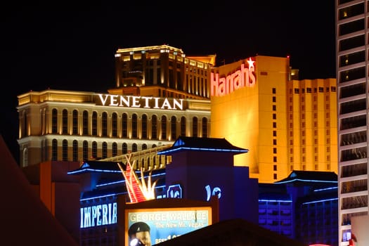 Las Vegas, USA - November 30, 2011: The Las Vegas Strip boasts a large number of world class resorts, hotels,and casinos.  Seen here are the Imperial Palace Hotel and Casino, Harrah's Las Vegas, and The Venetian Resort Hotel Casino located in the central part of the Strip.