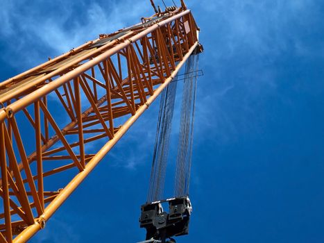 big crane in shipyard looks deep in sky