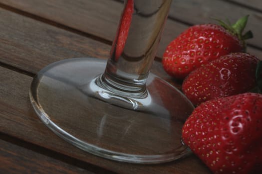 glass and strawberries