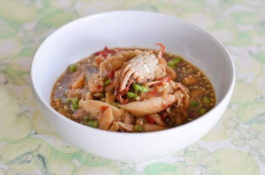  santol salad with steamed crab in  white bowl , very spicy 