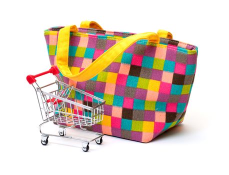 Vibrant Cloth Ladies Handbag with Shopping Cart on white background 
