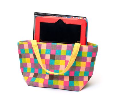 Vibrant Cloth Ladies Handbag with Tablet PC on white background 