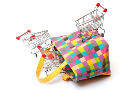 Shopping Cart with Vibrant Bag on white background