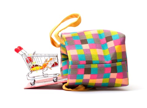 Shopping Cart with Vibrant Bag on white background