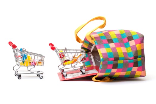 Shopping Cart with Vibrant Bag on white background