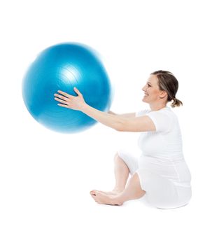 Pregnant woman sitting with exercise ball isolated on white background