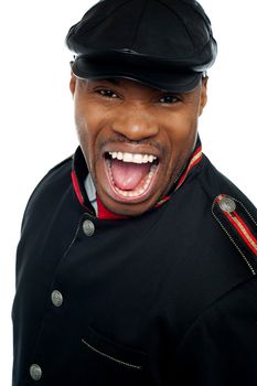 Shouting african man wearing cap isolated over white. Closeup shot