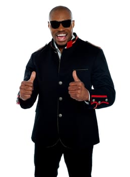Handsome excited african with double thumbs-up over white background