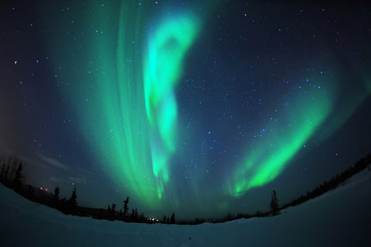 aurora borealis or northern lights on sky