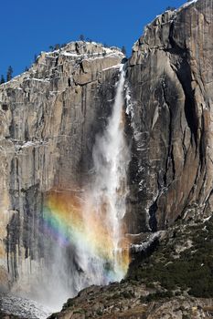 Yosemite Fall in Winter with a rainbow in winter