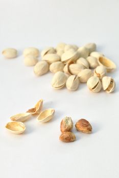 Pistachio nuts on isolated white background