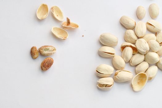 Pistachio nuts on isolated white background