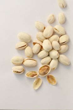 Pistachio nuts on isolated white background