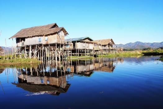 Landscape of wooden houses built in water in Myanmar