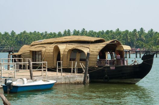 A parked houseboat on the backwaters of Kerala, India 