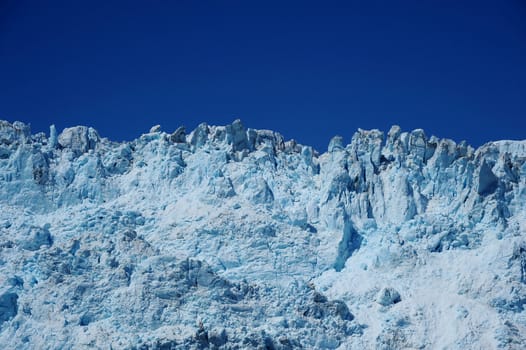 Aialik glacier with blue sky from Kenai Fjord National park, Alaska