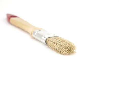 Paint brush with handle over white