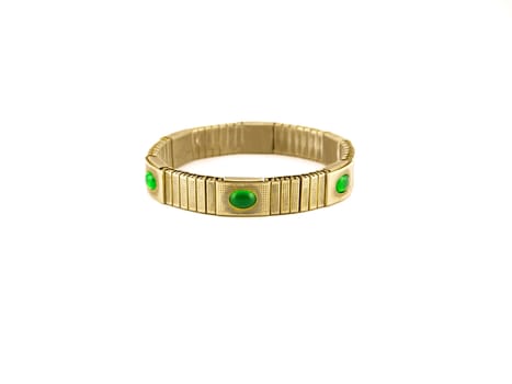 Golden bracelet with green gems over white