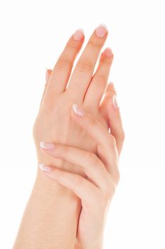 Beautiful female hands with nice french manicure isolated on white background