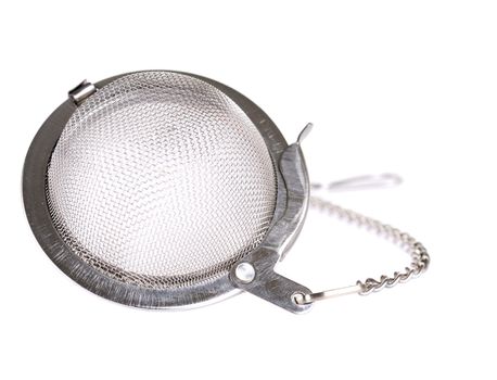 Metal tea strainer on white background close-up and with clipping path