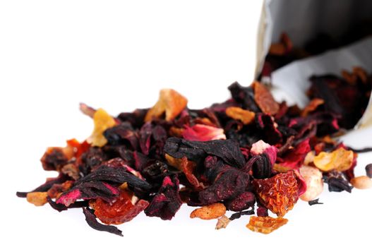 Heap of fruit and floral tea falling outa bag