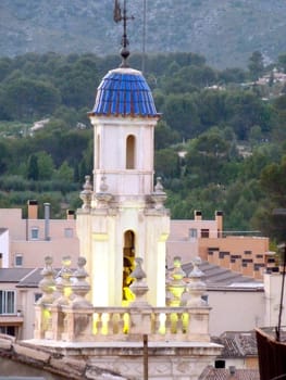 illuminated bell tower at twilight