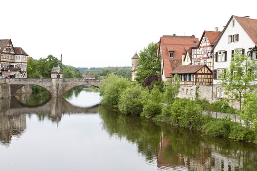 historic town in south west germany with river and stone bridge