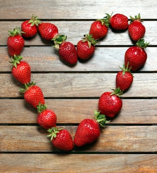 a heart made of strawberries