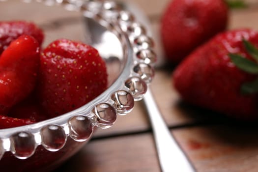 glass bowl of fresh strawberries