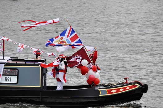 LONDON, UK, Sunday June 3, 2012. Hundred of boats muster on the river Thames in Putney (west London) for the Thames Diamond Jubilee Pageant to celebrate the Queen's Diamond Jubilee.