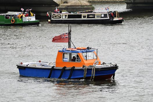 LONDON, UK, Sunday June 3, 2012. Hundred of boats muster on the river Thames in Putney (west London) for the Thames Diamond Jubilee Pageant to celebrate the Queen's Diamond Jubilee.