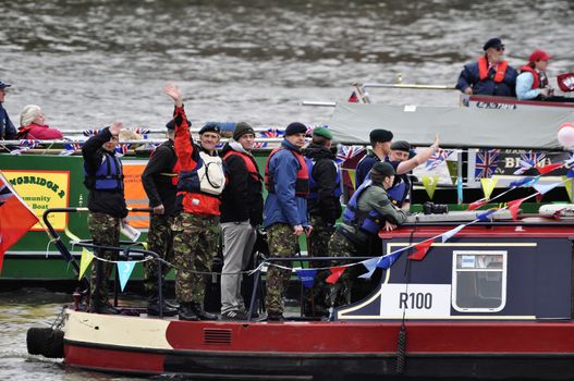 LONDON, UK, Sunday June 3, 2012. Hundred of boats muster on the river Thames in Putney (west London) for the Thames Diamond Jubilee Pageant to celebrate the Queen's Diamond Jubilee.