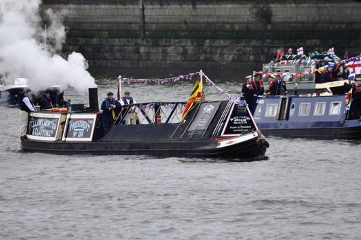 LONDON, UK, Sunday June 3, 2012. Hundred of boats muster on the river Thames in Putney (west London) for the Thames Diamond Jubilee Pageant to celebrate the Queen's Diamond Jubilee.