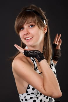 Young dancer woman in white dress.