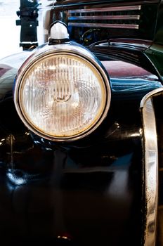 Close up front light of retro car