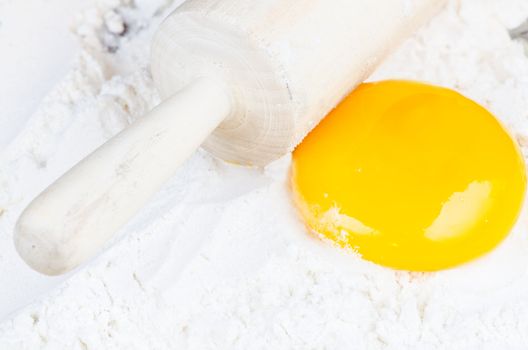 Press dough flour and yolk close up