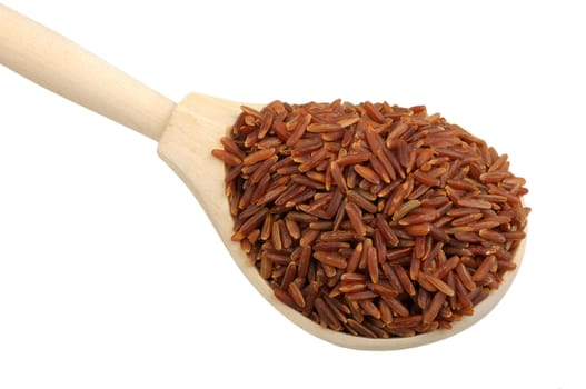 red rice on wooden spoon isolated on white a background