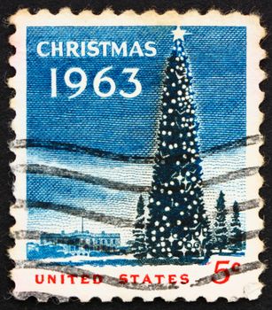 UNITED STATES OF AMERICA - CIRCA 1963: a stamp printed in the USA shows National Christmas Tree and White House, Christmas, circa 1963