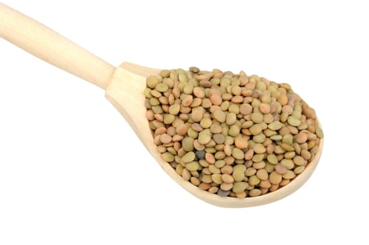 lentils in wooden spoon isolated on white background